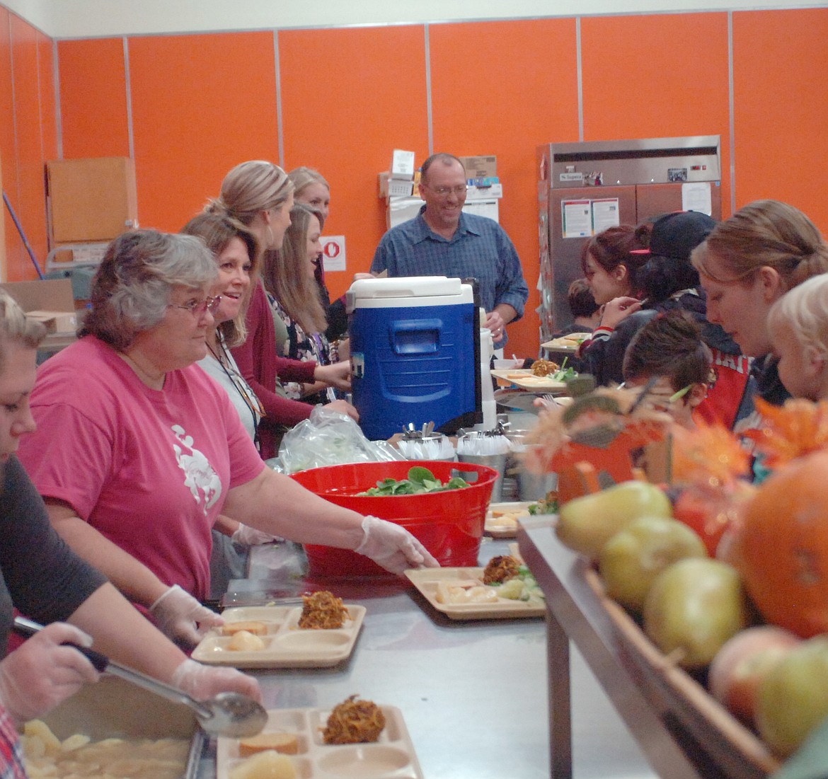 Volunteer servers were kept very busy serving the meal offered at LInderman Elementary School during Family Heritage Night on Nov. 15.