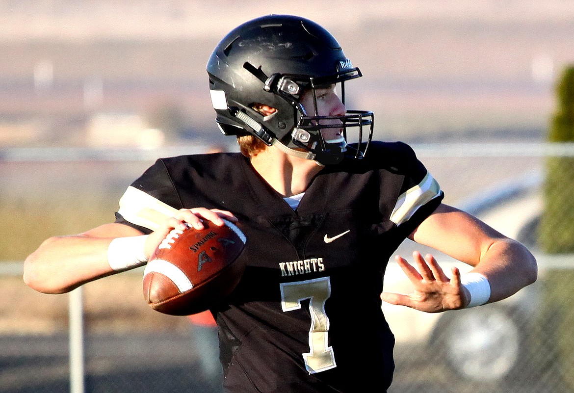 Rodney Harwood/Sun Tribune - Royal quarterback Sawyer Jenks winds up to make a throw during the third quarter of Saturdy's 1A state quarterfinal game against Mt. Baker at David Nielsen Stadium.