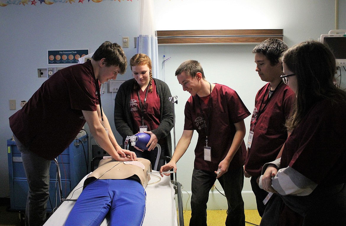 High school students participated in REACH, Research and Explore Awesome Careers in Healthcare, at Mineral Community Hospital to learn about careers in healthcare, including resuscitation techniques using a mannequin. (Kathleen Woodford/Mineral Independent)