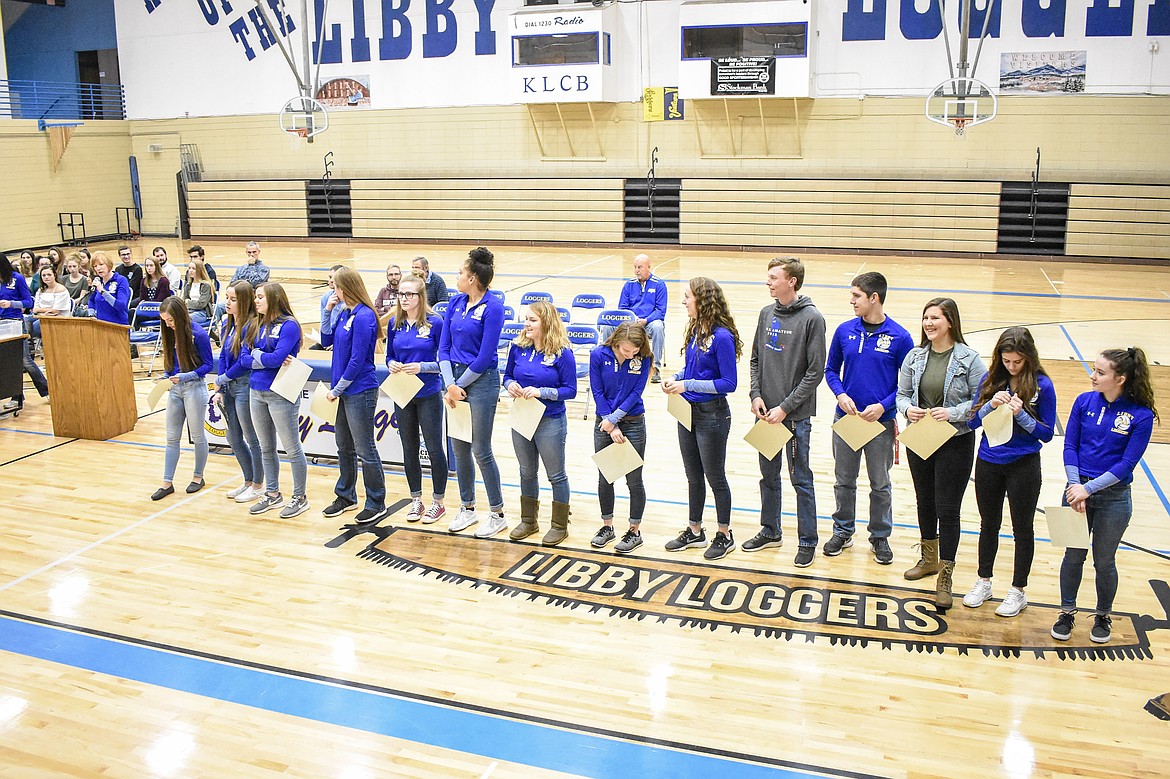 Libby High School volleyball Head Coach Cindy Ostrem-Johnston spoke to her team one last time about her pride and enjoyment from her time coaching them during the Fall Awards Assembly Thursday. Saying that in time all the wins and losses would become a blur, she said she hoped they would always remember the stories, events and traditions, “but most of all the relationships that were cultivated as a result of being a team.” (Ben Kibbey/The Western News)