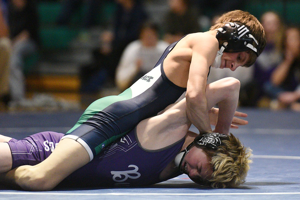 Glacier's Dylan Miller wrestles Butte's Keagan Gransbery at 103 pounds at Glacier High School on Friday. (Casey Kreider/Daily Inter Lake)