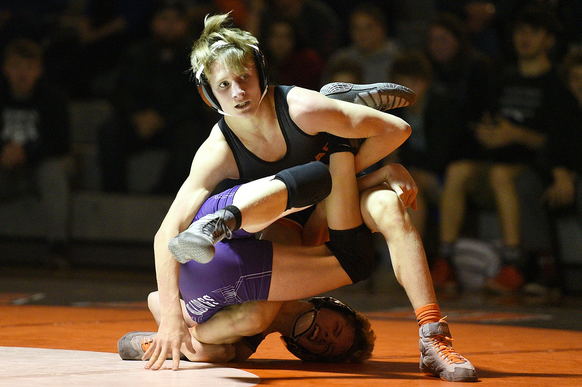 Flathead's Cole Eastwood wrestles Butte's Keagan Gransbery at 103 pounds at Flathead High School on Friday. (Casey Kreider/Daily Inter Lake)