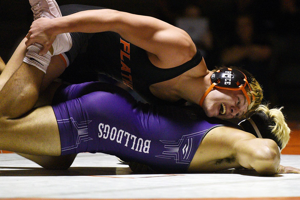 Flathead's Paxton Boyce wrestles Butte's Kameron Moreno at 182 pounds at Flathead High School on Friday. (Casey Kreider/Daily Inter Lake)