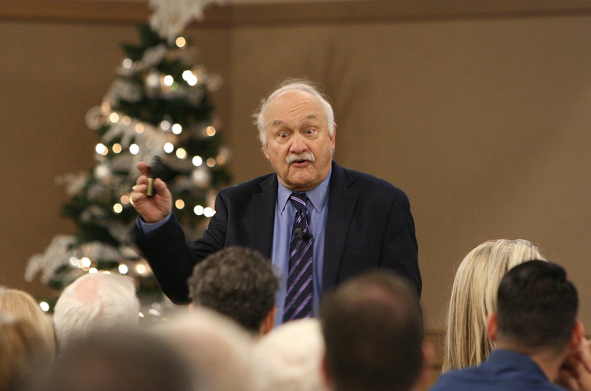 Economist John Mitchell told Coeur d'Alene Chamber of Commerce members on Friday that he expects the economy to continue to be strong in 2019, but there are domestic and foreign situations to keep an eye on. (BRIAN WALKER/Press)