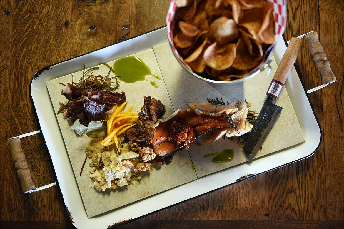 The House Charcuterie Board featuring a selection of chef's choice and housemade ingredients, cured meats, fine cheeses, preserves, pickles and crostini at Wilderness Provisions &amp; Eatery on Wednesday, Dec. 5. (Casey Kreider/Daily Inter Lake)