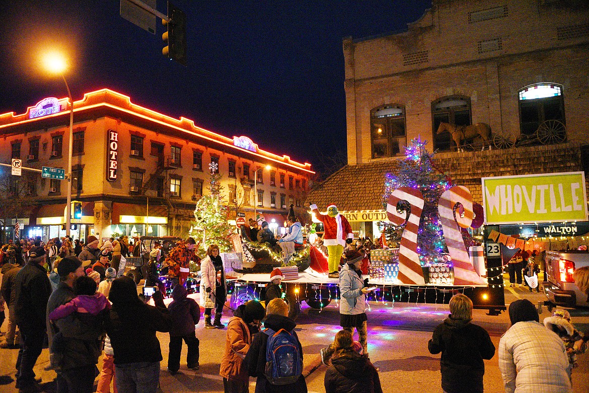 Floats make their way down Main Street during the 2018 Kalispell Christmas Parade on Saturday. (Casey Kreider/Daily Inter Lake)