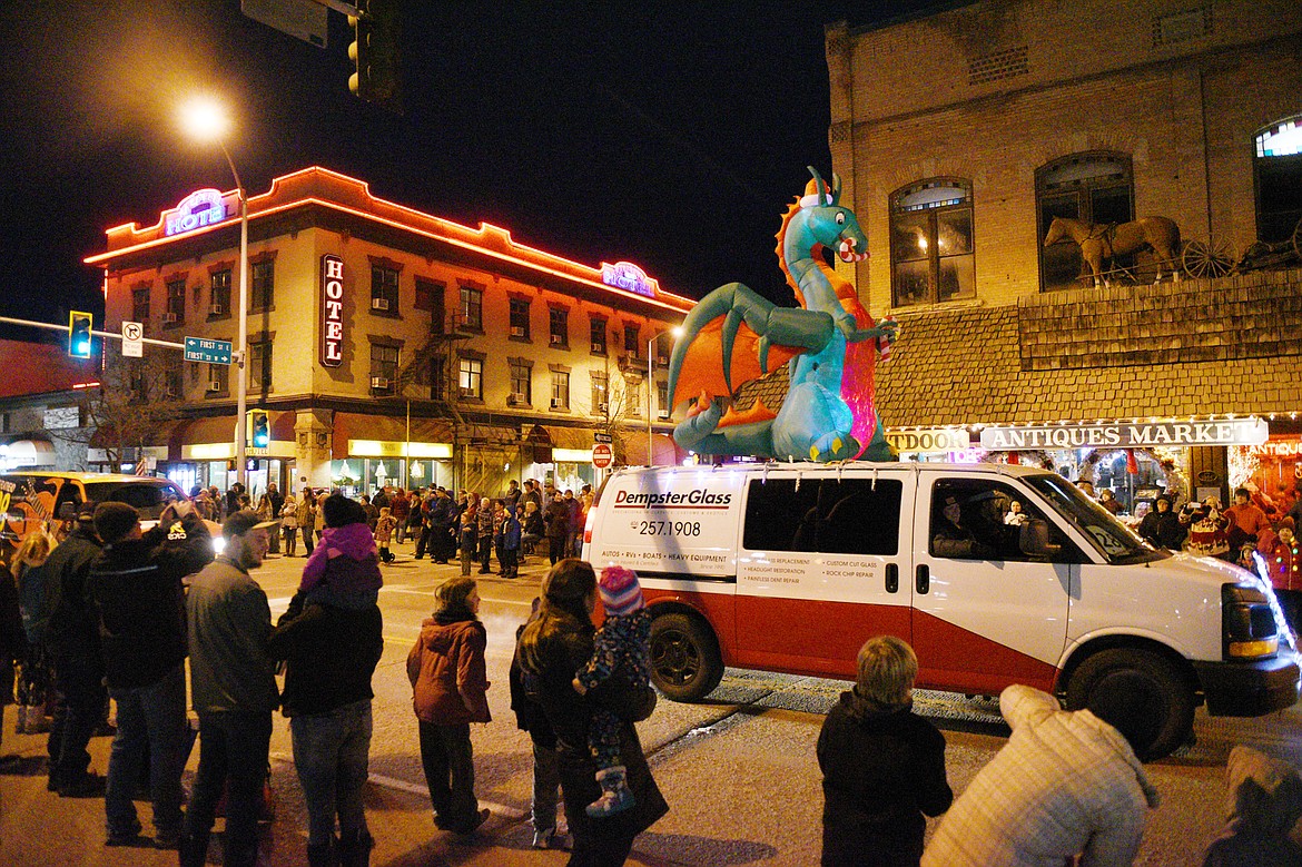 Floats make their way down Main Street during the 2018 Kalispell Christmas Parade on Saturday. (Casey Kreider/Daily Inter Lake)