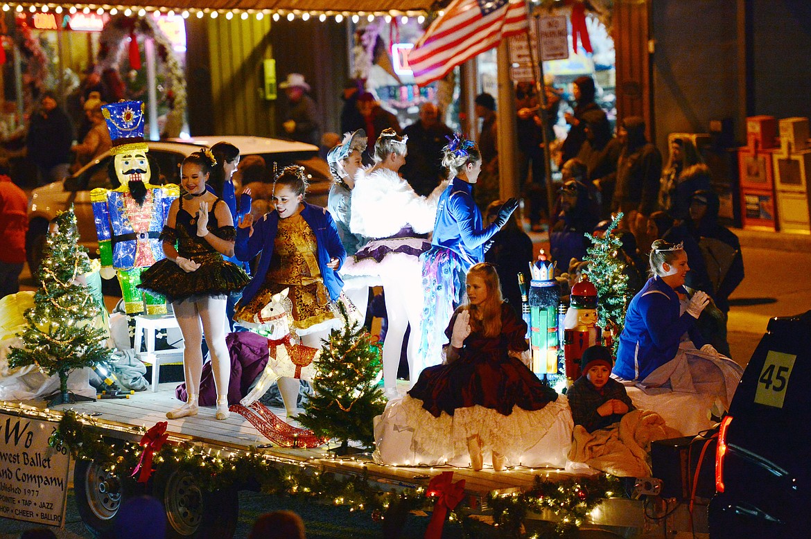 Floats make their way down Main Street during the 2018 Kalispell Christmas Parade on Saturday. (Casey Kreider/Daily Inter Lake)