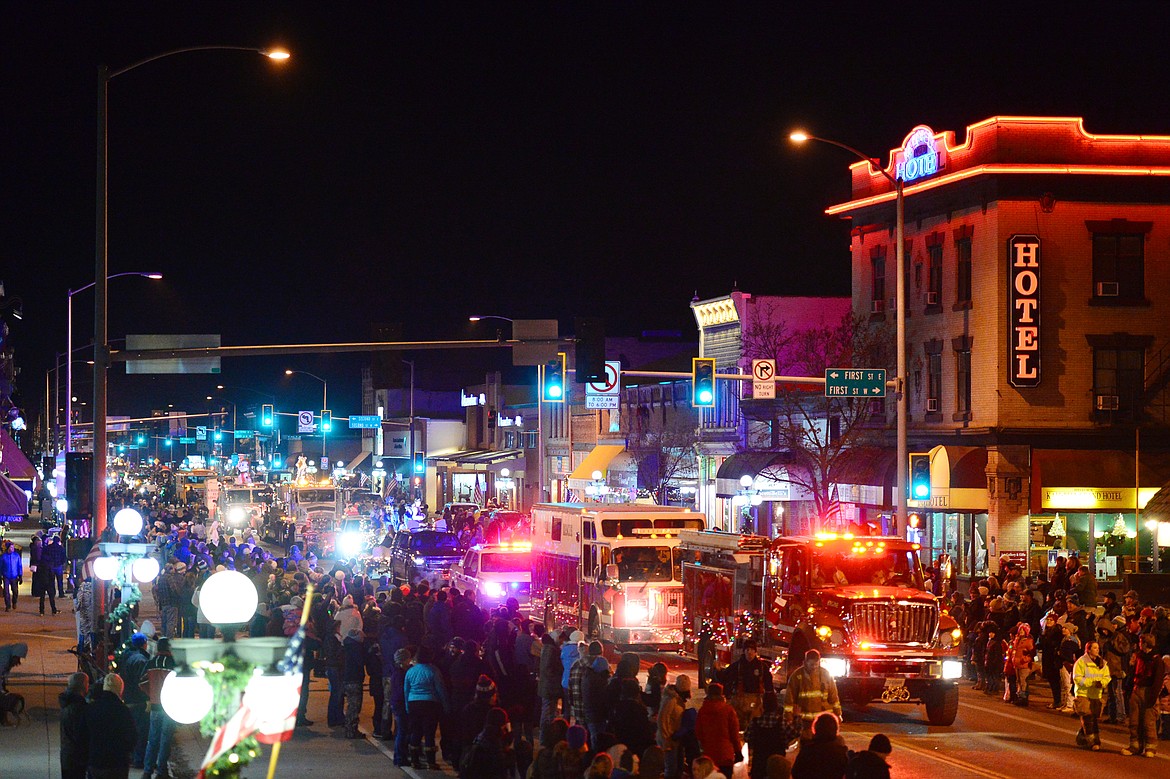 Floats make their way down Main Street during the 2018 Kalispell Christmas Parade on Saturday. (Casey Kreider/Daily Inter Lake)