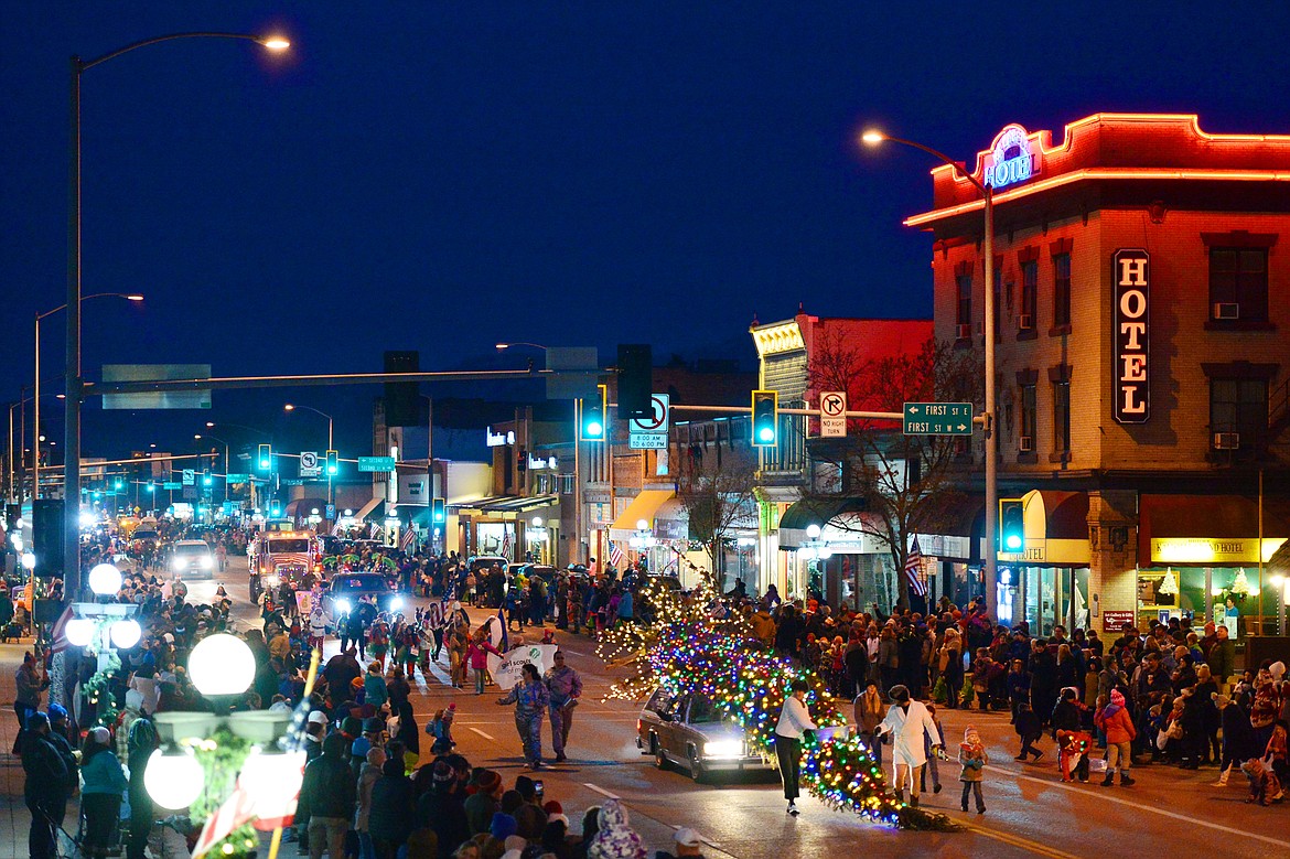 Floats make their way down Main Street at the start of the 2018 Kalispell Christmas Parade on Saturday. (Casey Kreider/Daily Inter Lake)