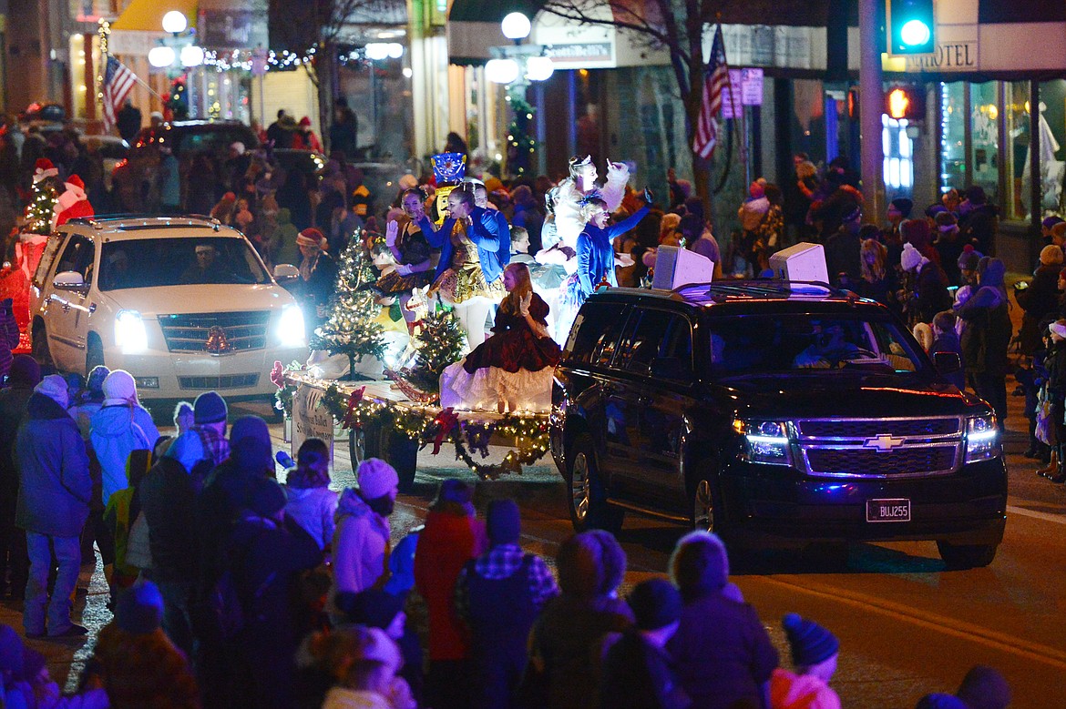 Floats make their way down Main Street during the 2018 Kalispell Christmas Parade on Saturday. (Casey Kreider/Daily Inter Lake)