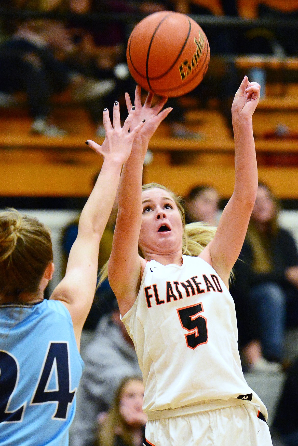 Flathead's Maddie Walter (5) shoots over Great Falls' Gracie Lins (24) in the first half at Flathead High School on Friday. (Casey Kreider/Daily Inter Lake)