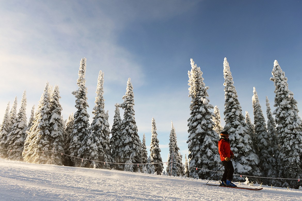 A skier heads toward Gray Wolf on opening day at Whitefish Mountain Resort on Thursday. (Casey Kreider/Daily Inter Lake)