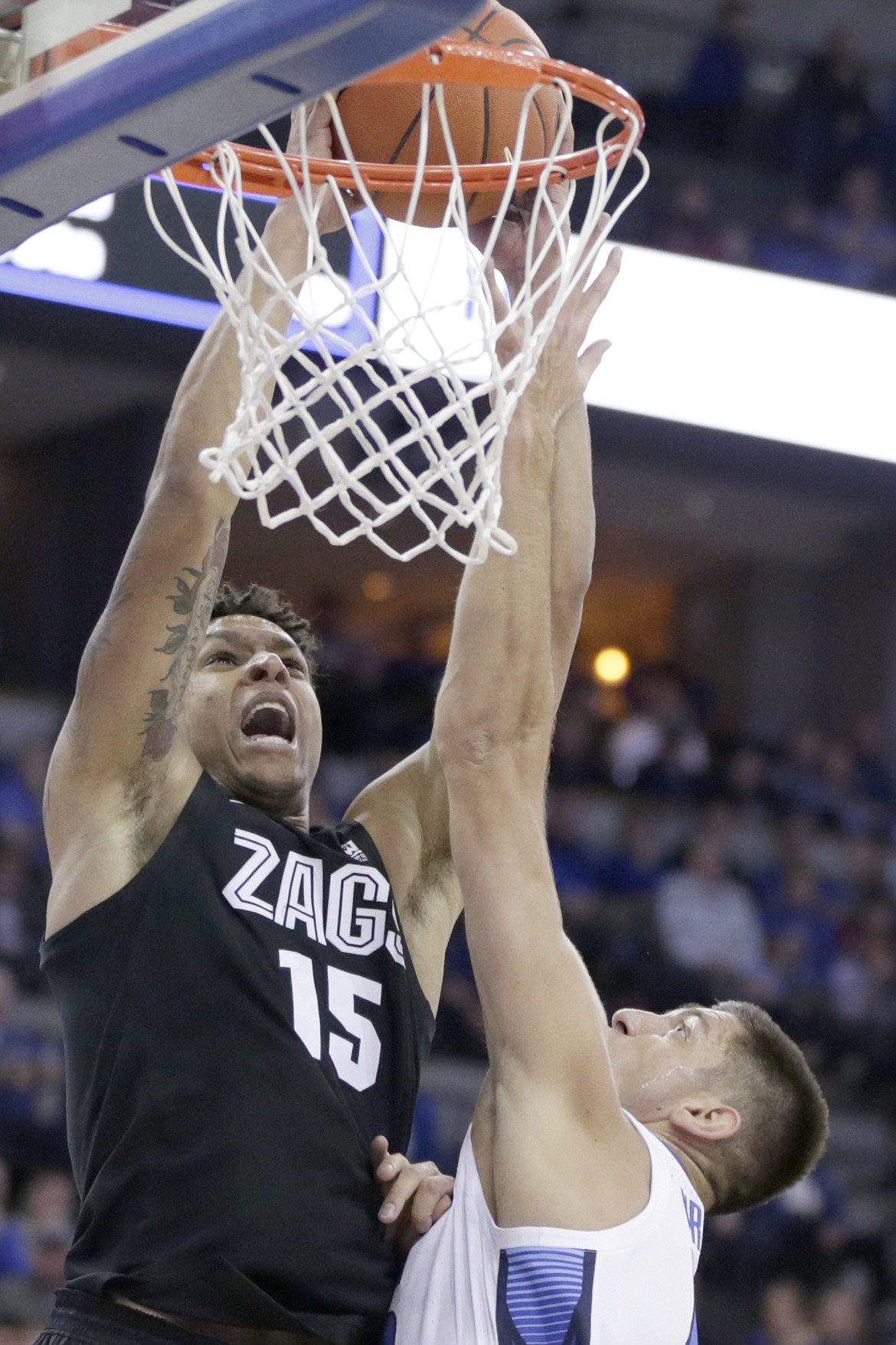 Gonzaga&#146;s Brandon Clarke (15) is fouled by Creighton&#146;s Martin&#160;Krampelj, right, during the first half of an NCAA college basketball game in Omaha, Neb., Saturday, Dec. 1, 2018. (AP Photo/Nati Harnik)
