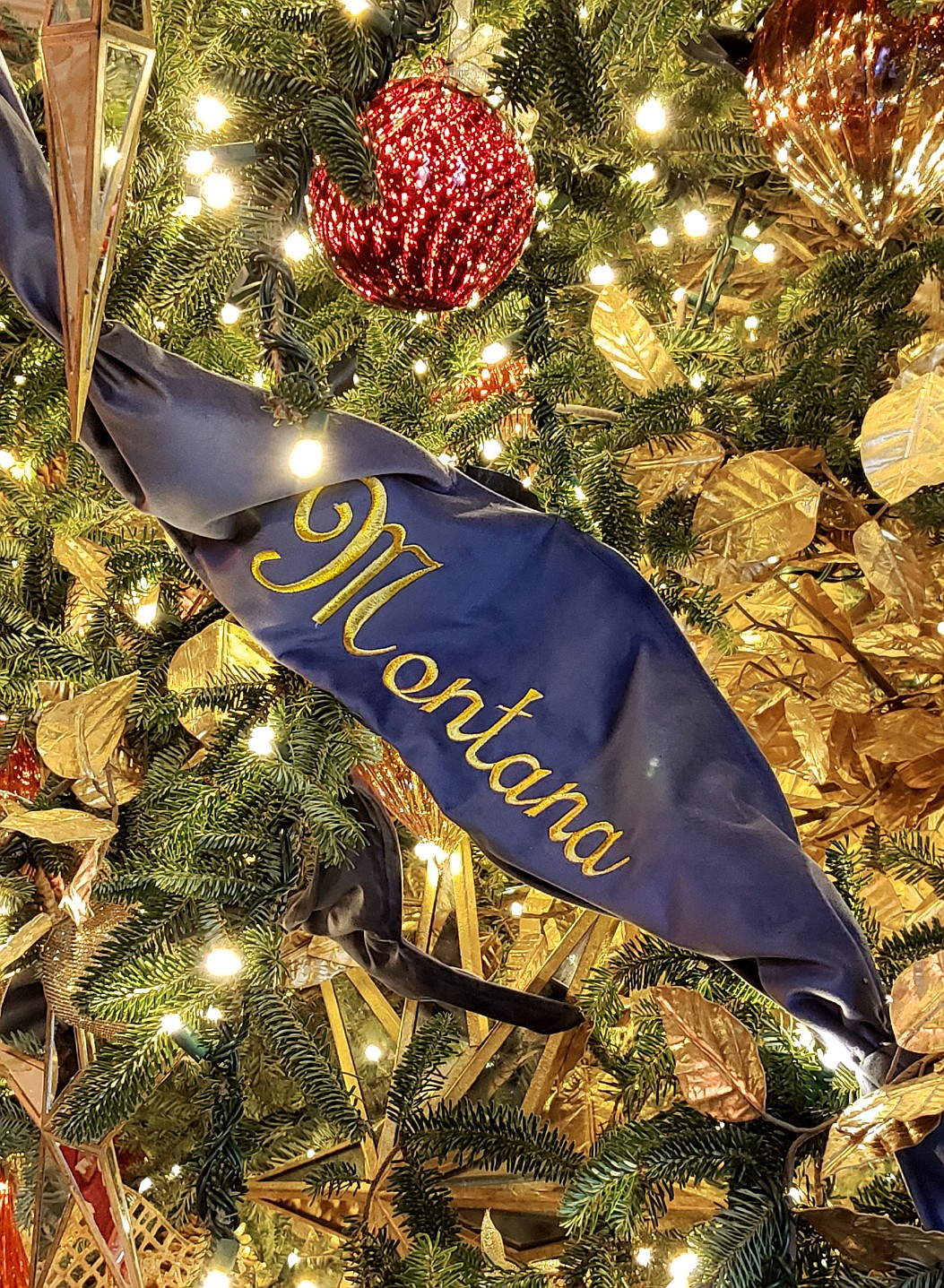 All 50 states names were embroidered on blue ribbon to adorn the official White House tree displayed in the Blue Room.(Photo courtesy of Cecilia Egdorf)