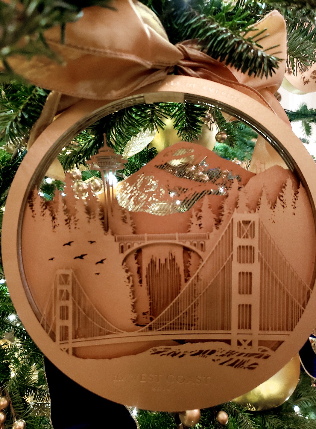 The paper later cut ornament depicting scenes from the West Coast. Used on the trees in the East Room of the White House.(Photo courtesy of Cecilia Egdorf)