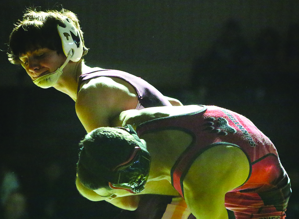 Connor Vanderweyst/Columbia Basin Herald
Moses Lake's Riley Burgess grapples with Sunnyside's Sam Guerrero.