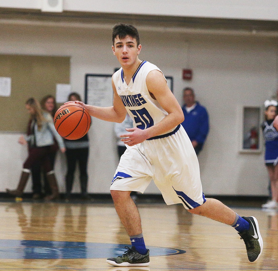 Coeur d&#146;Alene&#146;s Gavin Margo dribbles the ball around the 3-point arc in a game against Ferris.