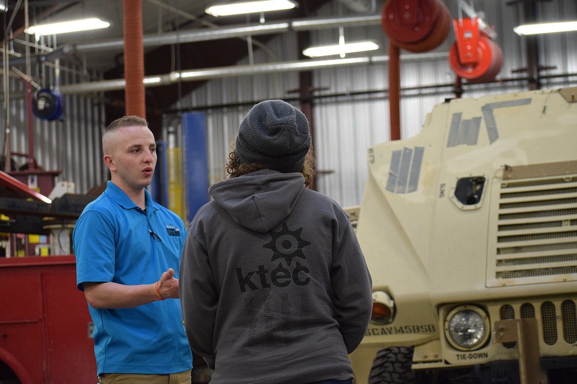 Specialist Hunter Keller of the Idaho Army National Guard chats with KTEC students during an interactive presentation for the auto mechanic, diesel, and welding classes that brought National Guard personnel and trucks into the school. (ANDREW ENRIQUEZ/Courtesy)