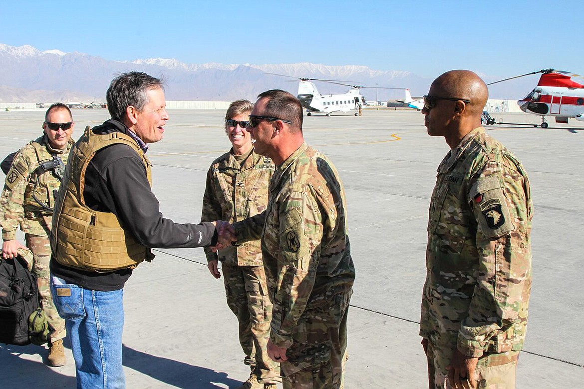 U.S. Sen. Steve Daines, R-Mont., visits with members of the National Guard&#146;s 495th Combat Sustainment Support Battalion in Afghanistan last weekend. (Photo provided)