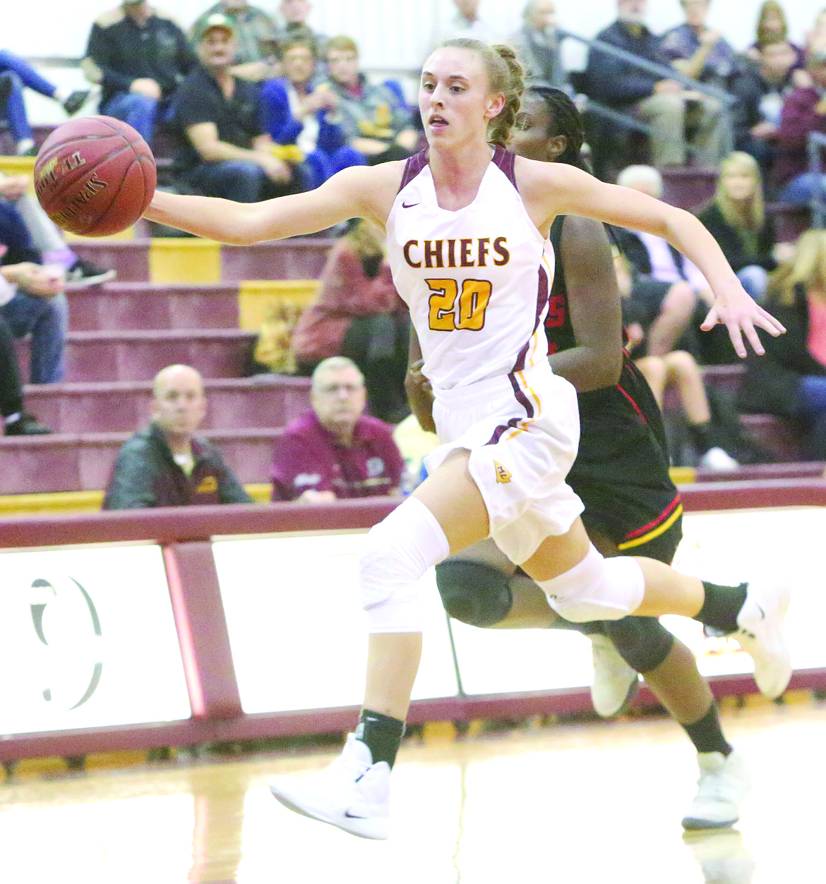 Connor Vanderweyst/Columbia Basin Herald
Moses Lake's Camille Carpenter tracks down a long pass against Kamiakin.