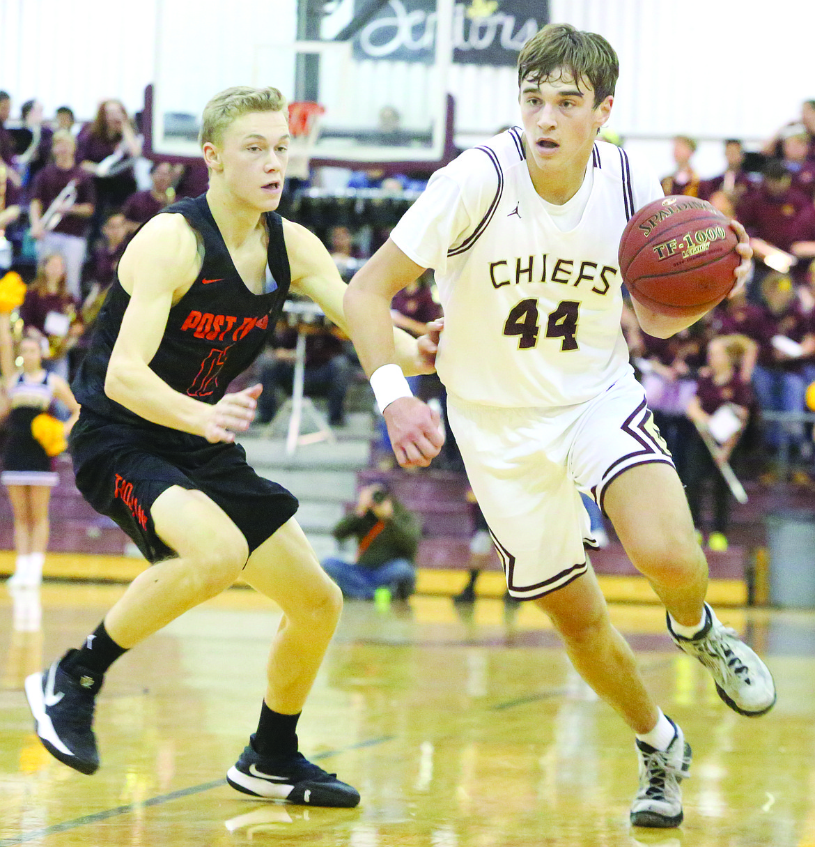 Connor Vanderweyst/Columbia Basin Herald
Moses Lake's Kyle Karstetter (44) drives past Post Falls defender Isaac Ballew.