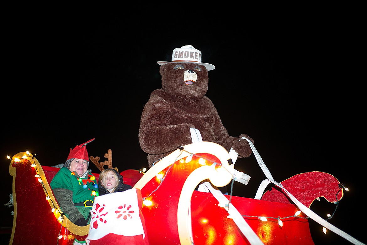 Smokey Bear and Munch the elf.