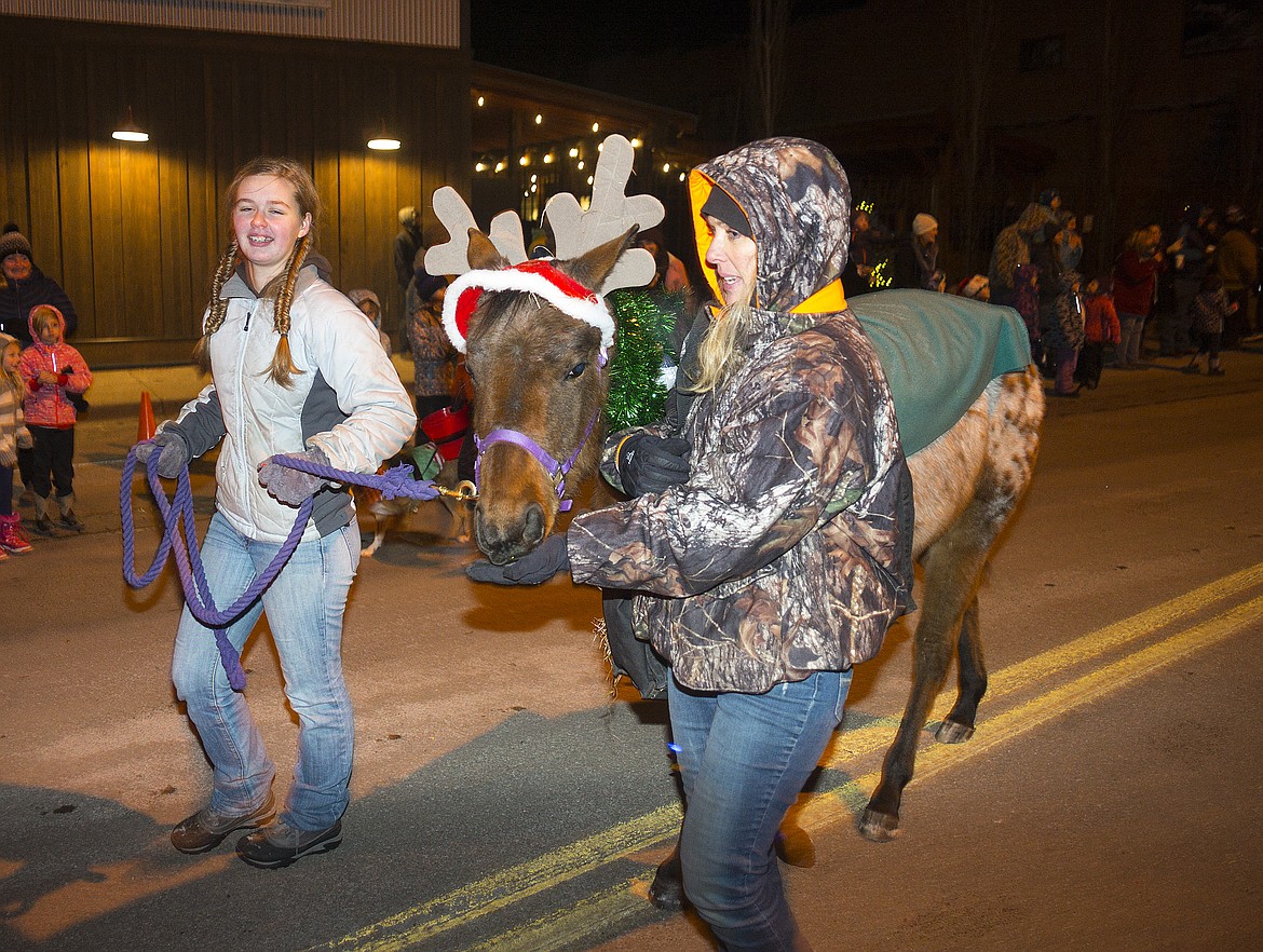 Treats keep a horse happy at the end of the parade.