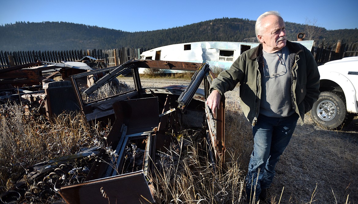 Jerry Wisher stands in the yard at Wisher&#146;s Auto Recycling on Nov. 20. (Photos by Brenda Ahearn/Daily Inter Lake)