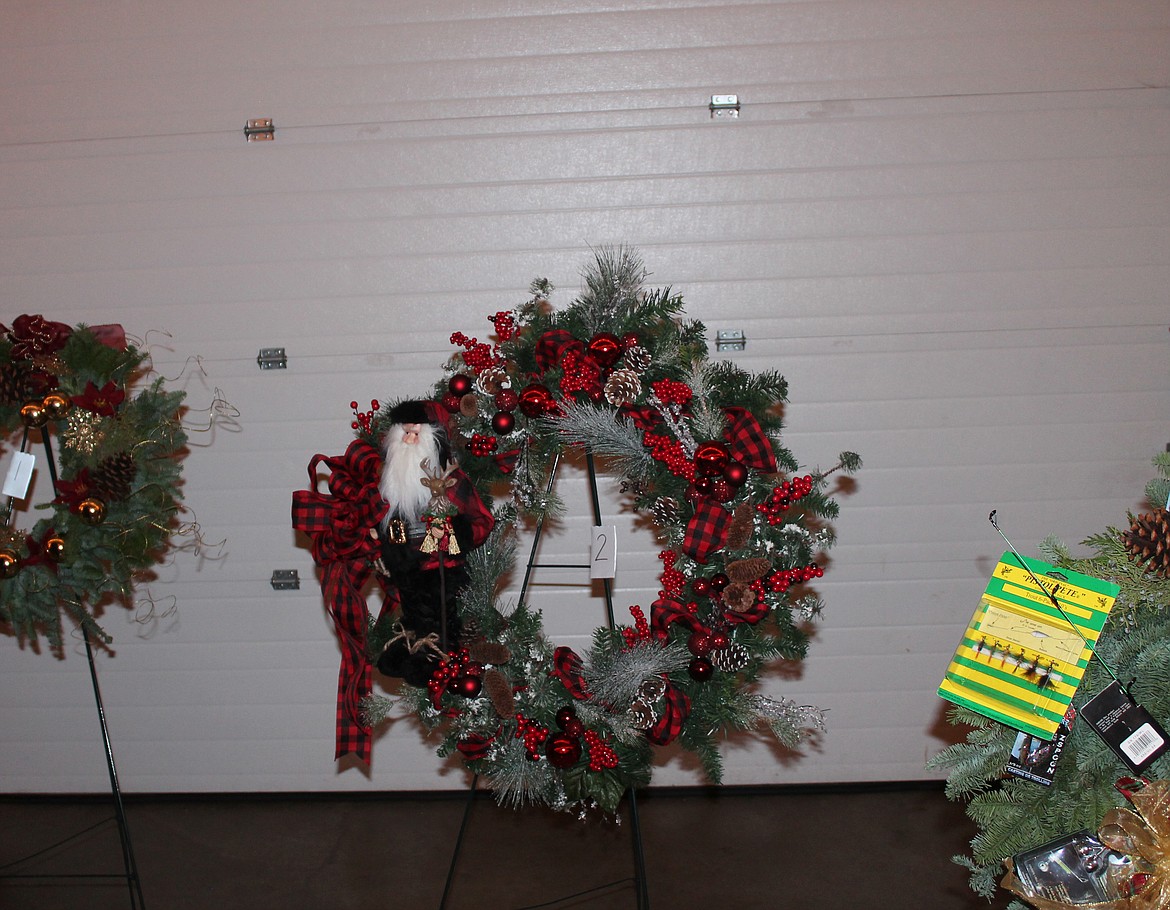 Joel Martin/Columbia Basin Herald
Besides the auctioned prizes, there was also an array of wreaths up for raffle at the Festival of Trees Saturday night.