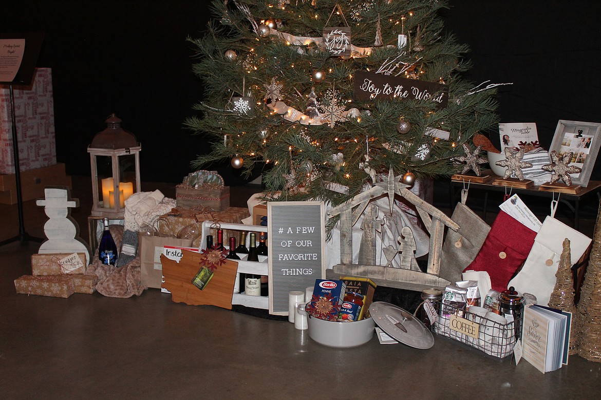 Joel Martin/Columbia Basin Herald
The tree donated by Moses Lake Presbyterian Church brought with it a few of the donors&#146; (and hopefully the buyer&#146;s) favorite things.