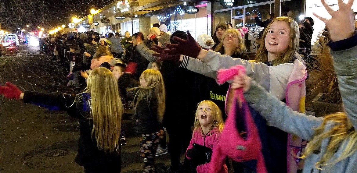 Richard Byrd/Columbia Basin Herald
Third Avenue in Moses Lake was lined with people Friday night during the annual Ag Parade.