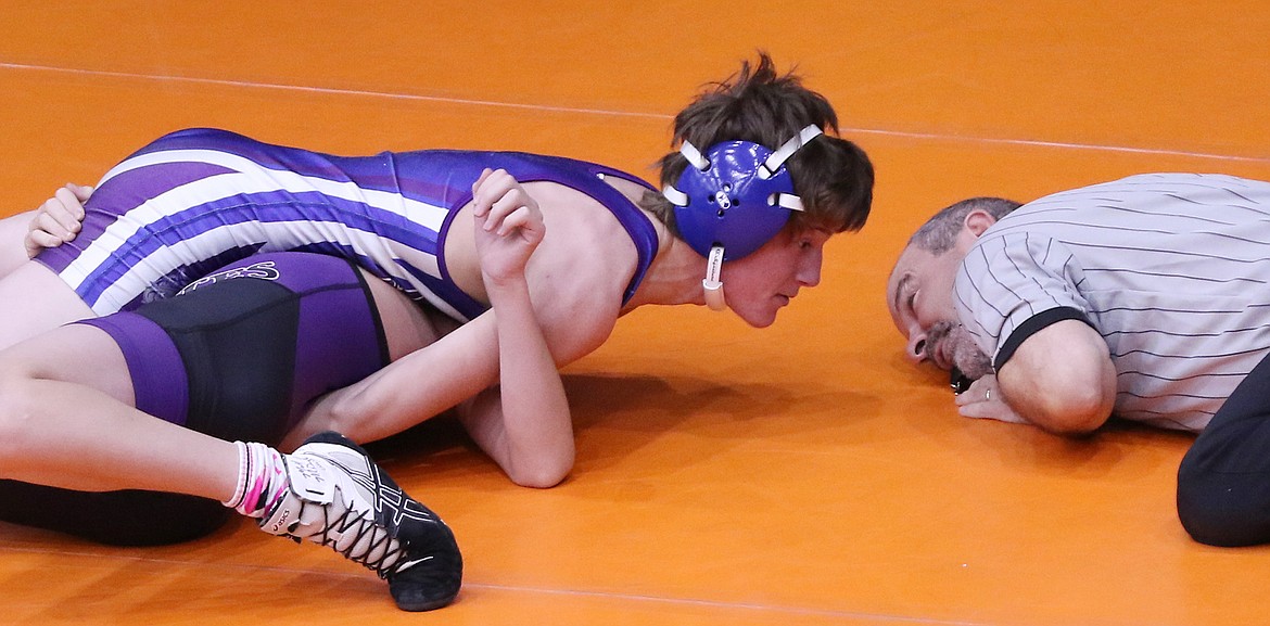 Mission/Charlo&#146;s Walter Murphy, on top above, finished in fourth place in the 120-pound class at the Owen Invite. (Bob Gunderson/Lake County Leader)