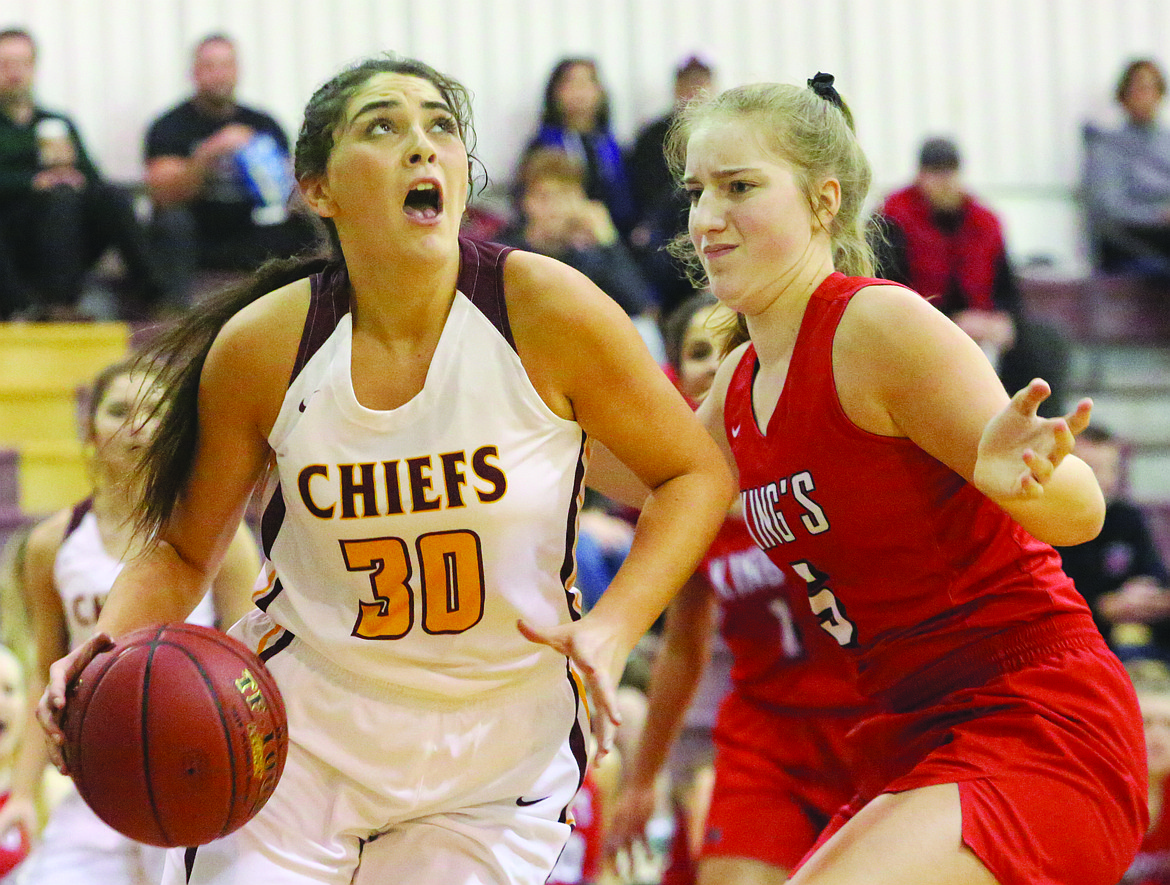 Connor Vanderweyst/Columbia Basin Herald
Moses Lake forward Victoria Hernandez drives baseline against King's defender Mia Flor.