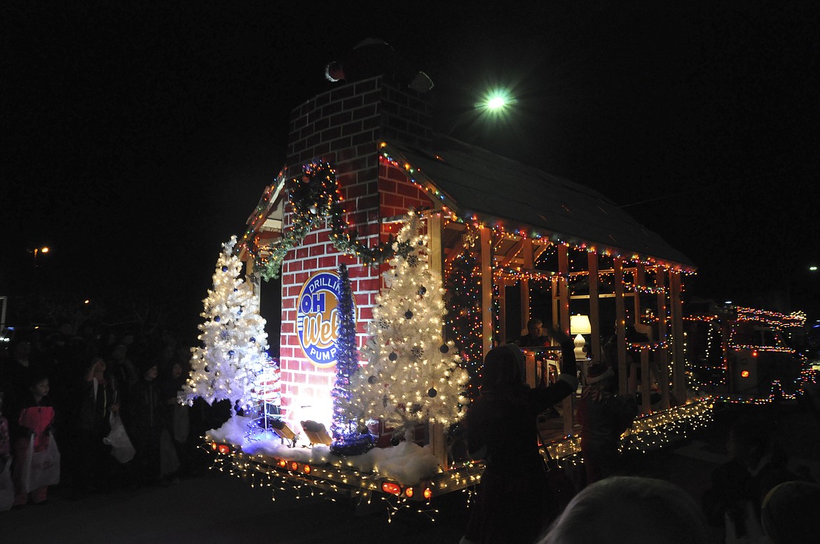 Folks with Oh Well Drilling and Pumping stole the show with their float during the Polson Parade of Lights Friday, Nov. 30. (Ashley Fox/Lake County Leader)