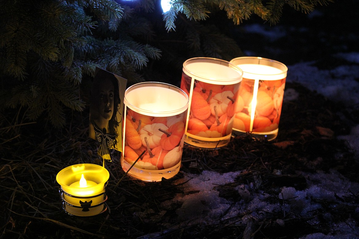 The PEAK Foundation held their Annual Tree Lighting ceremony in Alberton on Friday, Nov. 30 where people could leave candles under the tree for remembrance or to honor loved ones. (Kathleen Woodford/Mineral Independent)