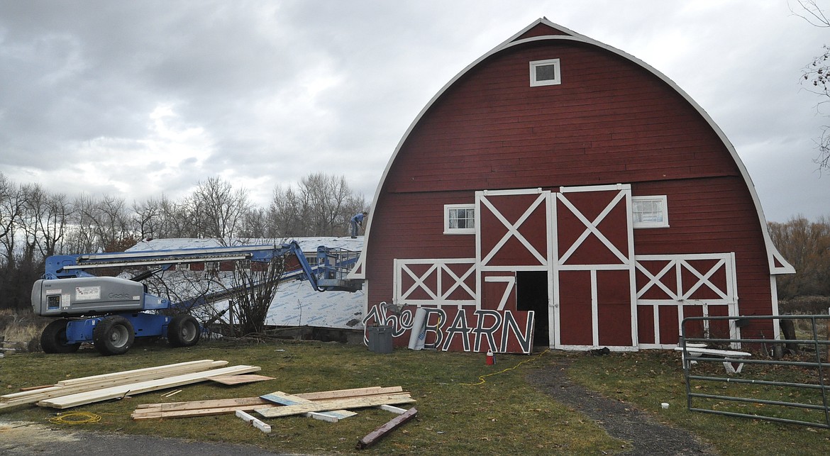 On Nov. 28, a new roof was being installed on The Barn in St. Ignatius. (Ashley Fox/Lake County Leader)