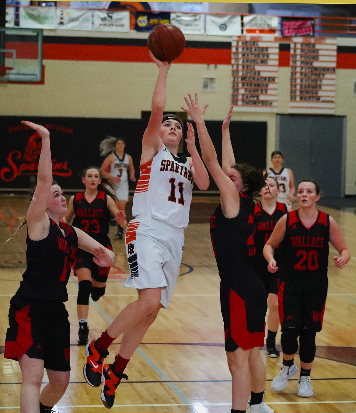 (Photo by KYLE CAJERO)
Karah Fink scores in transition during a Dec. 15 loss.