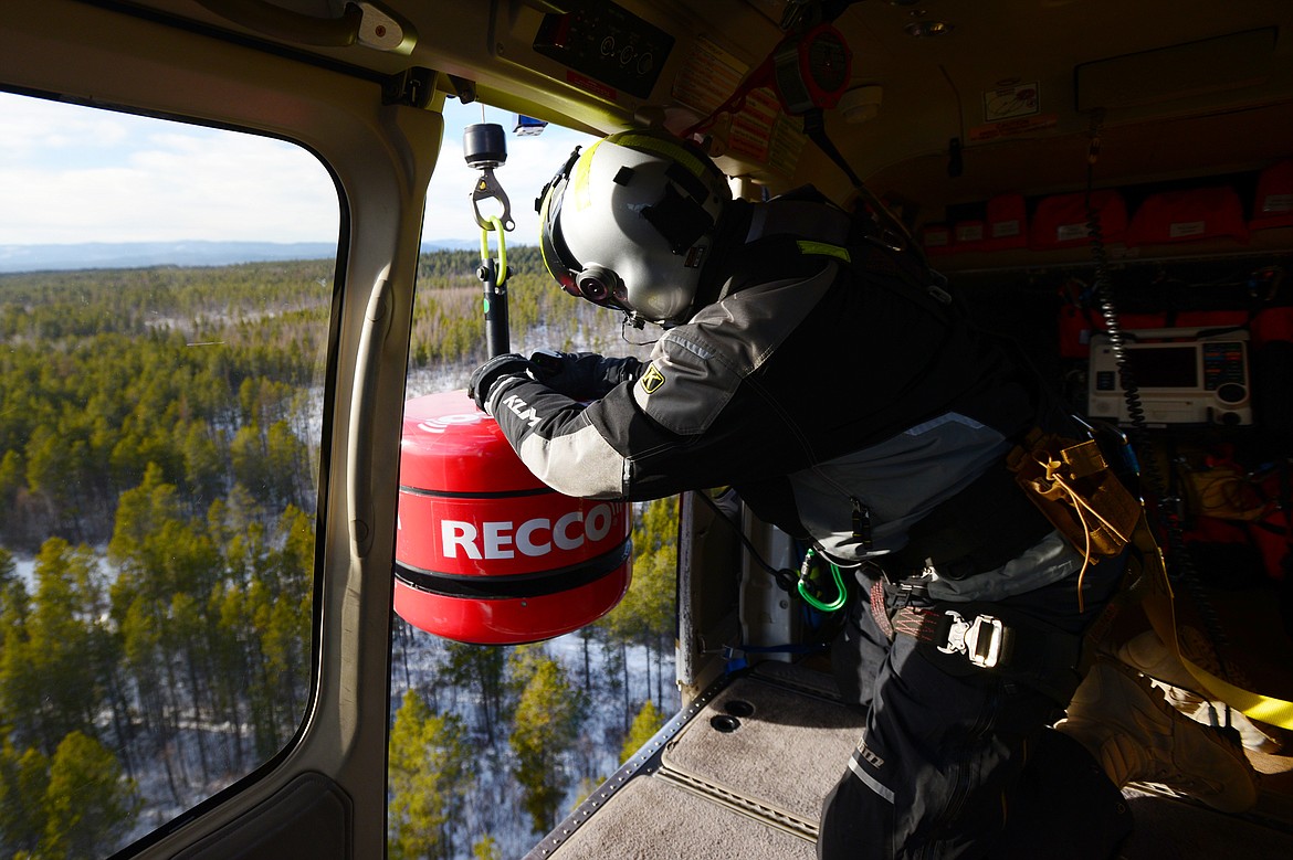 Flathead County Sheriff Chuck Curry deploys the RECCO Helicopter Detector during a training exercise with Two Bear Air Rescue on Friday.