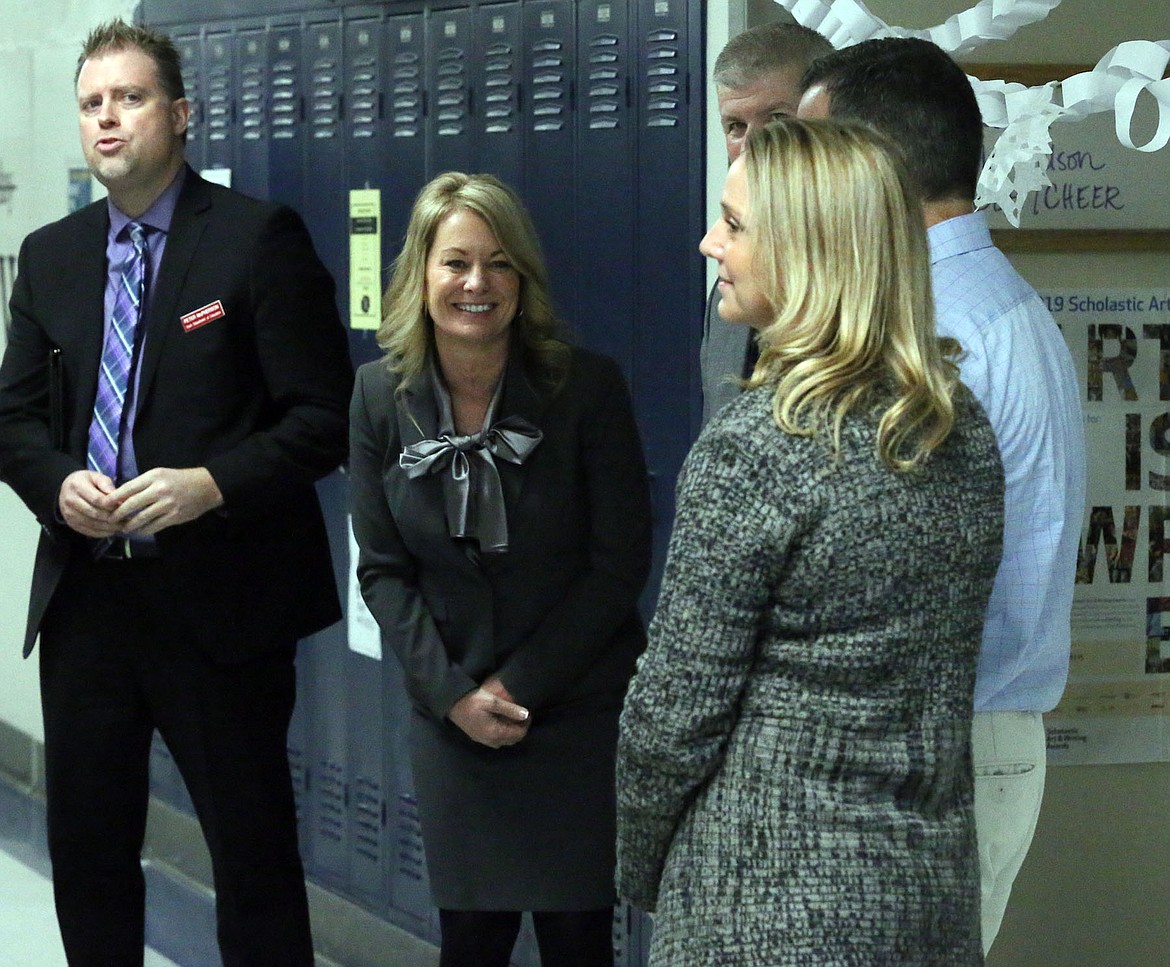 JUDD WILSON/Press
Superintendent of Public Instruction Sherri Ybarra talks with Coeur d&#146;Alene School District officials while touring Lakes Middle School on Wednesday. Pictured, from left: Chief Deputy Superintendent Peter McPherson, Ybarra, Lakes Middle School principal Jeff Bengtson and trustees Casey Morrisroe and Tambra Pickford.