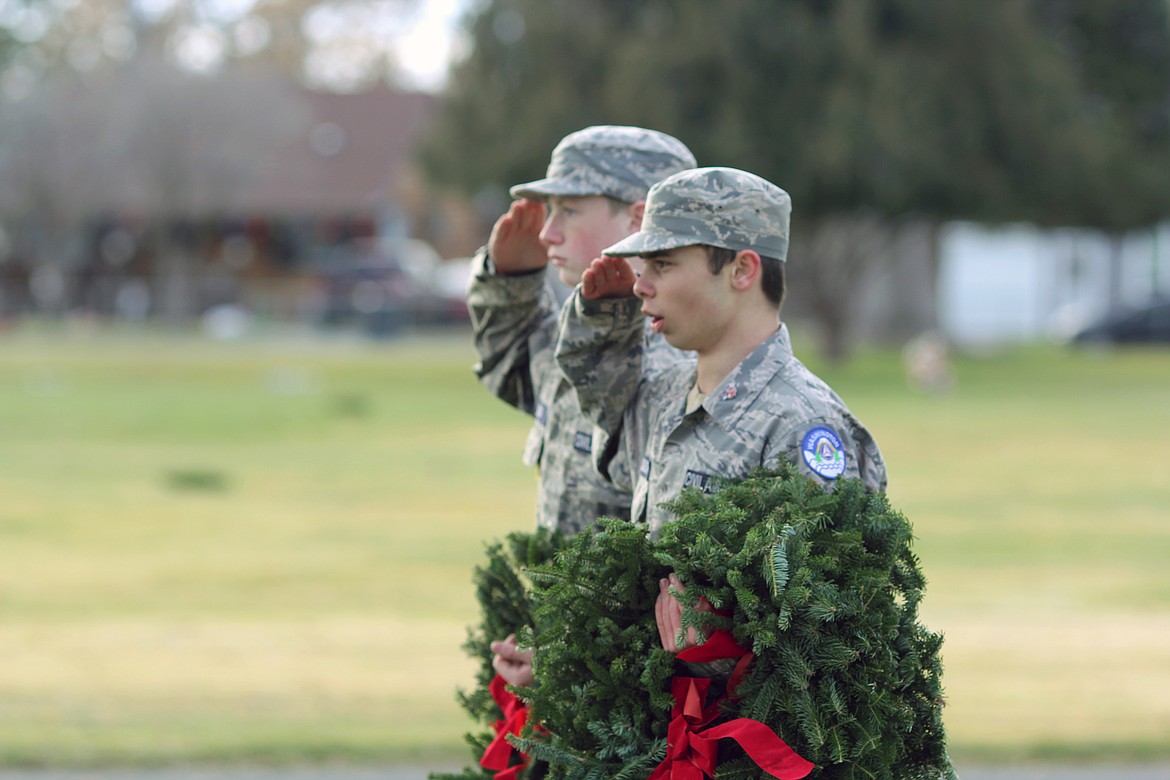 Emry Dinman/Columbia Basin Herald 
Cadets from the Civil Air Patrol Ephrata, who spent much of November gathering the money necessary for the event, laid many of the wreaths during the weekend&#146;s events.