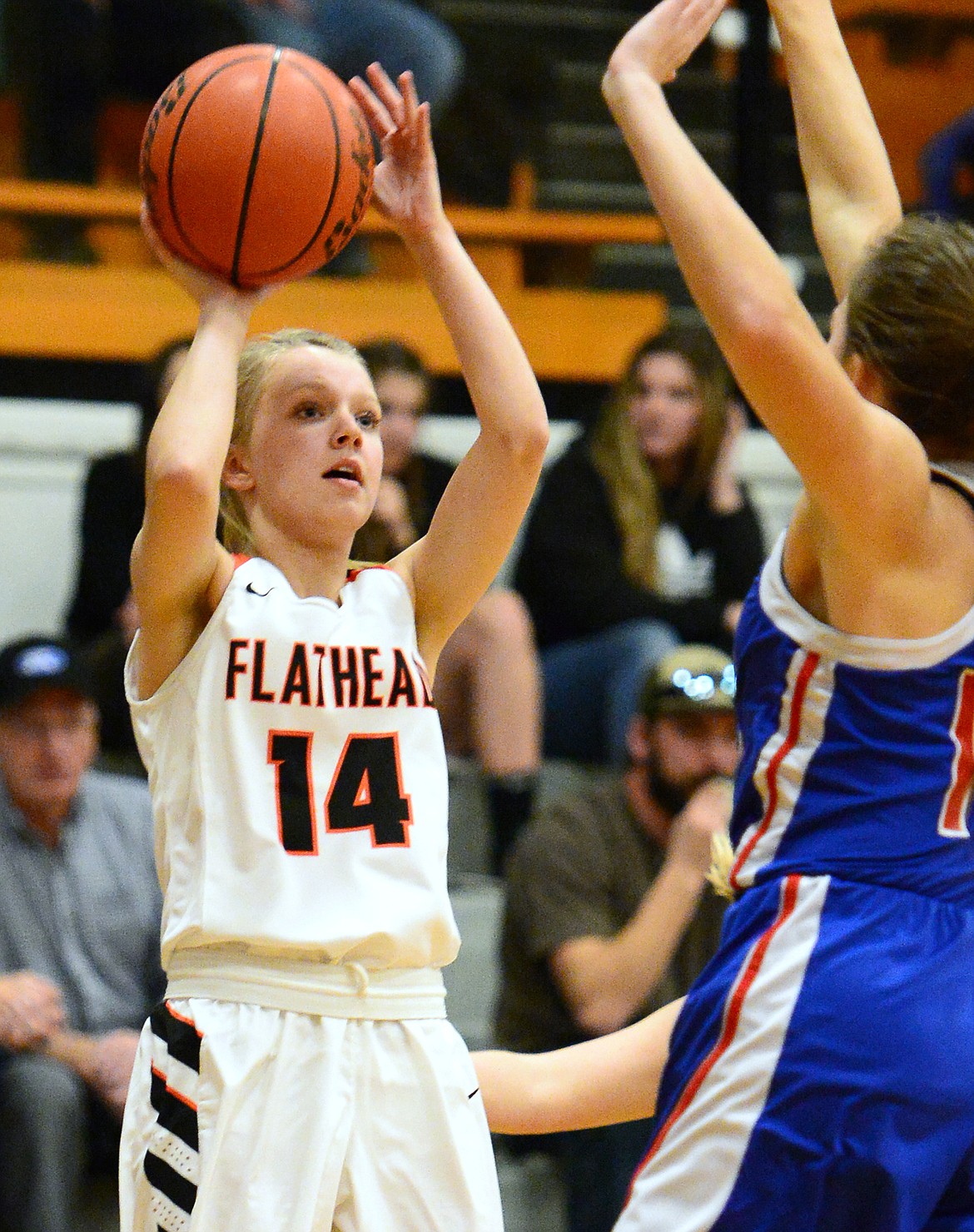 Flathead's Jenna Johnson (14) looks to shoot in the first half against Columbia Falls at Flathead High School on Saturday. (Casey Kreider/Daily Inter Lake)