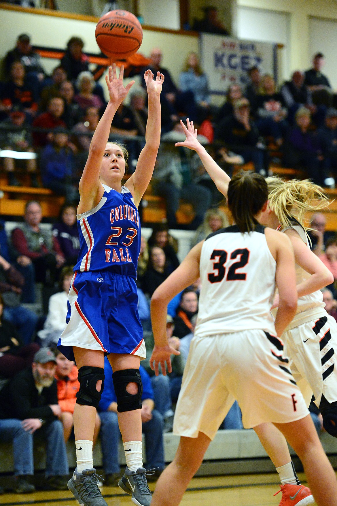 Columbia Falls' Ryley Kehr (23) hits a three against Flathead at Flathead High School on Saturday. (Casey Kreider/Daily Inter Lake)