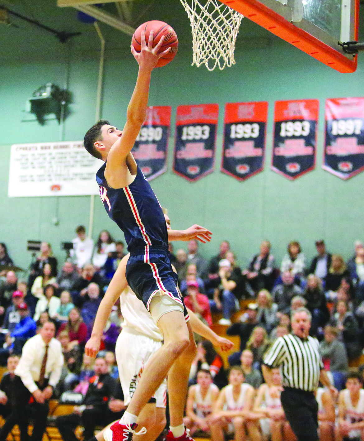 Connor Vanderweyst/Columbia Basin Herald
Ellensburg senior Steele Venters scores two of his 24 points against Ephrata.