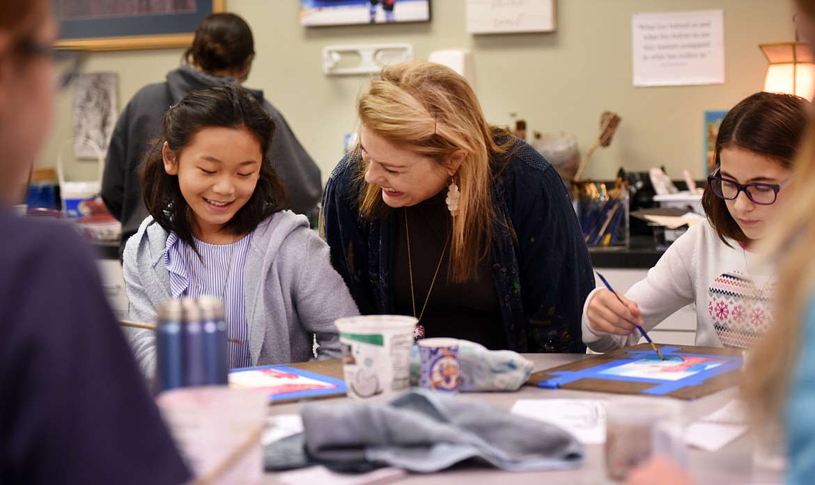 Sixth graders Lydia Chung, left, and Bella Zemake learning synthesis in Japanese style water color in Barb Beckwith&#146;s art class at Stillwater Christian School.
(Brenda Ahearn/Daily Inter Lake)