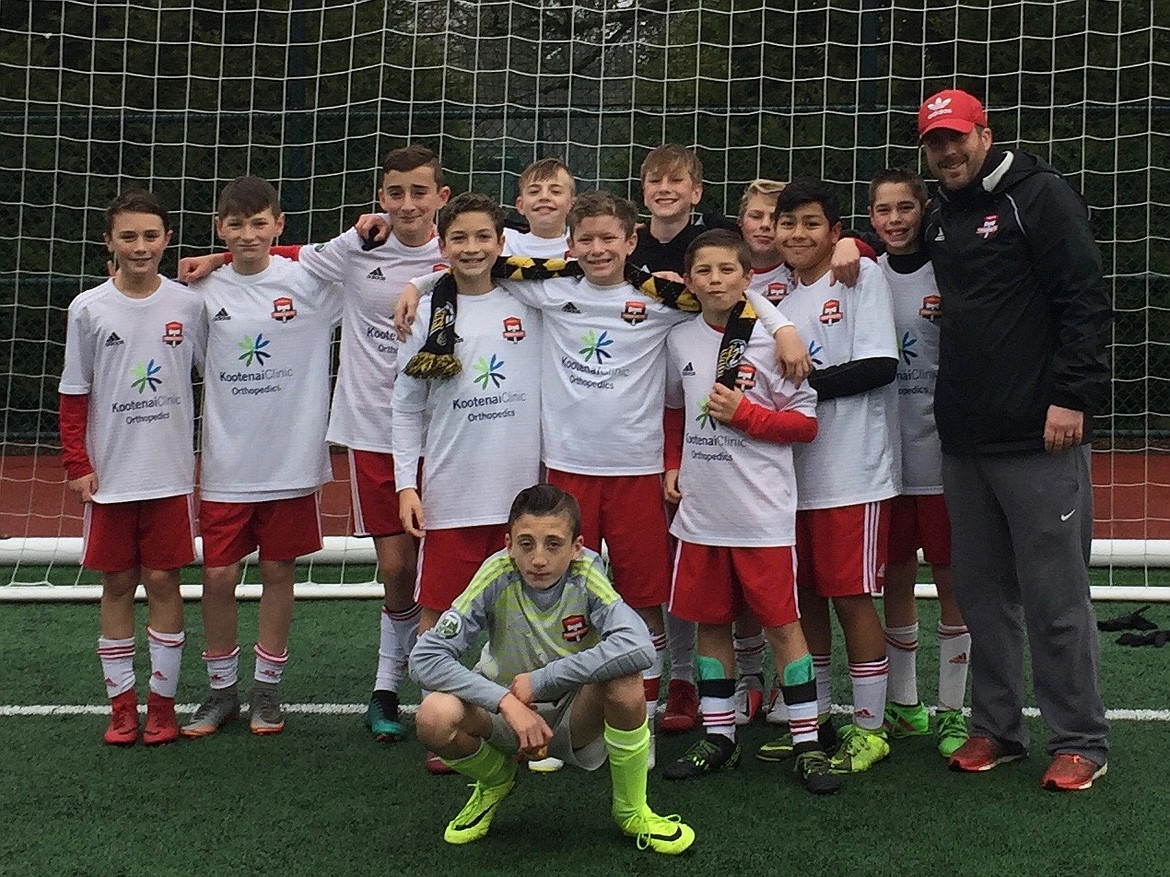 Courtesy photo
Timbers North FC Boys 06 Red soccer team wrapped up the Fall '18 RCL season in Seattle. On Dec. 1, TNFC defeated Eastside FC B06 Blue 6-2.  Haidyn Jonas had 2 goals. Connor Jump had 1 goal and 2 assists.  Kason Pintler had 1 goal and 1 assist.  Jacob Molina and Ben Hannigan-Luther each had 1 goal. Noah Waddell had 1 assist.
On Dec. 2, TNFC beat Crossfire Premier B06-D 7-1. Kason Pintler had 3 goals. Connor Jump and Kai Delio each with 1 goal and 2 assists. Jacob Molina and Haidyn Jonas each with 1 goal. Gavin Samayoa and Noah Waddell each had 1 assist. Braden Latscha defended the goal for both games.
TNFC is in 1st place in its RCL division with an undefeated record and a draw at the end of fall season play.  Next match is set for late January in Seattle.
In the front is Braden Latscha; middle row from left, Gavin Samayoa, Connor Jump and Brayden Ristic; and back row from left, Kason Pintler, Ben Hannigan-Luther, Kai Delio , Haidyn Jonas, Jacob Molina, Harper Barlow, Chief Natatqn Allen, Noah Waddell, and coach Nick Funkhouser.