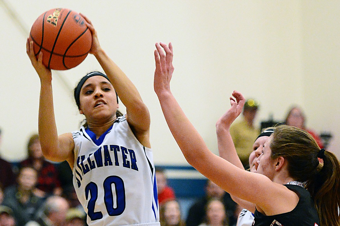 Stillwater Christian's Asiah Brockington (20) looks to pass in the first half against Flathead Valley Homeschool at Stillwater Christian School on Friday. (Casey Kreider/Daily Inter Lake)