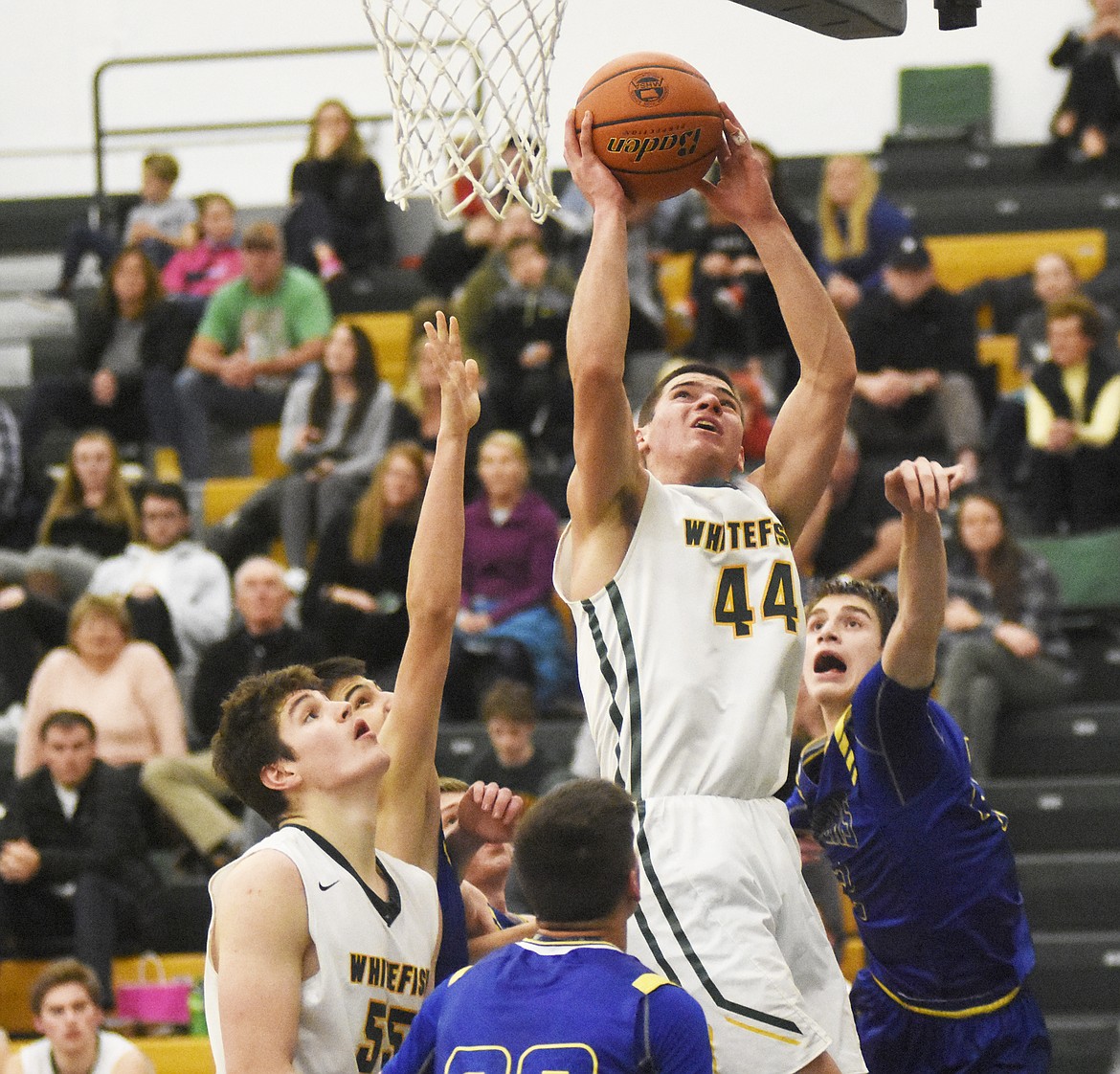 Lee Walburn rises for the layup in Friday&#146;s home win over Libby. (Daniel McKay/Whitefish Pilot)