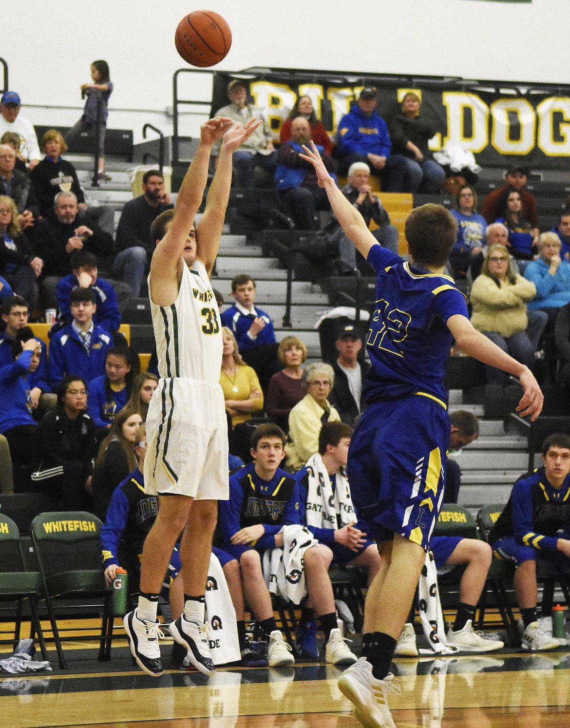 Ryan Kemm fires off a three in Friday&#146;s home win over Libby. (Daniel McKay/Whitefish Pilot)