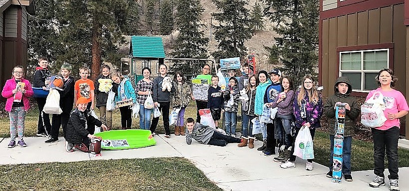 Mrs. Crabb’s and Ms. Foust’s fourth-grade class in Superior raised $670.39 and bought gifts and donated them to Women in Timber to give to Mineral County families in need for Christmas. (Photo courtesy of Mrs. Crabb)